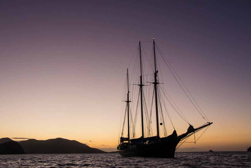 Blue Clipper in the sunset by Jan Broderick - Guest crew in the Caribbean