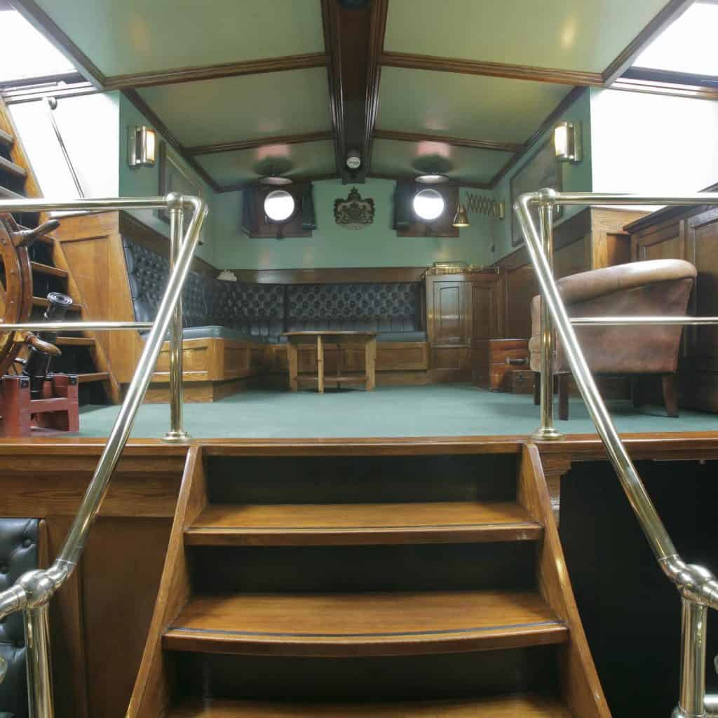 Oosterschelde interior saloon on the way up to the library area