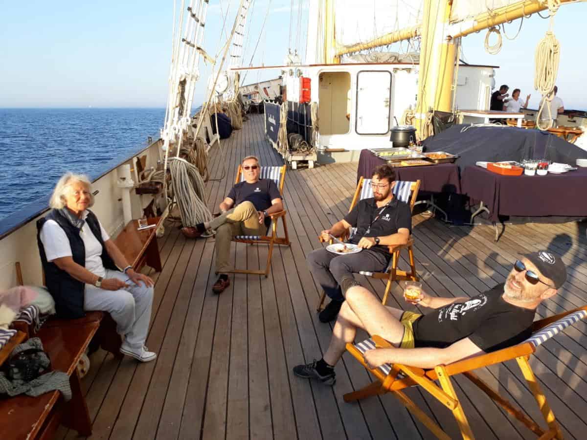 relaxing on a tall ship - but you are encouraged to help sail the ship