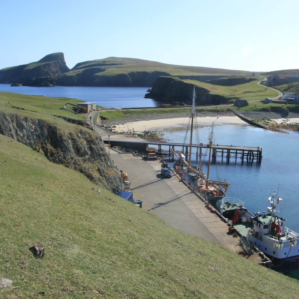Tecla alongside with charter guests in Fair Isle, and the Good Shepherd supply ship