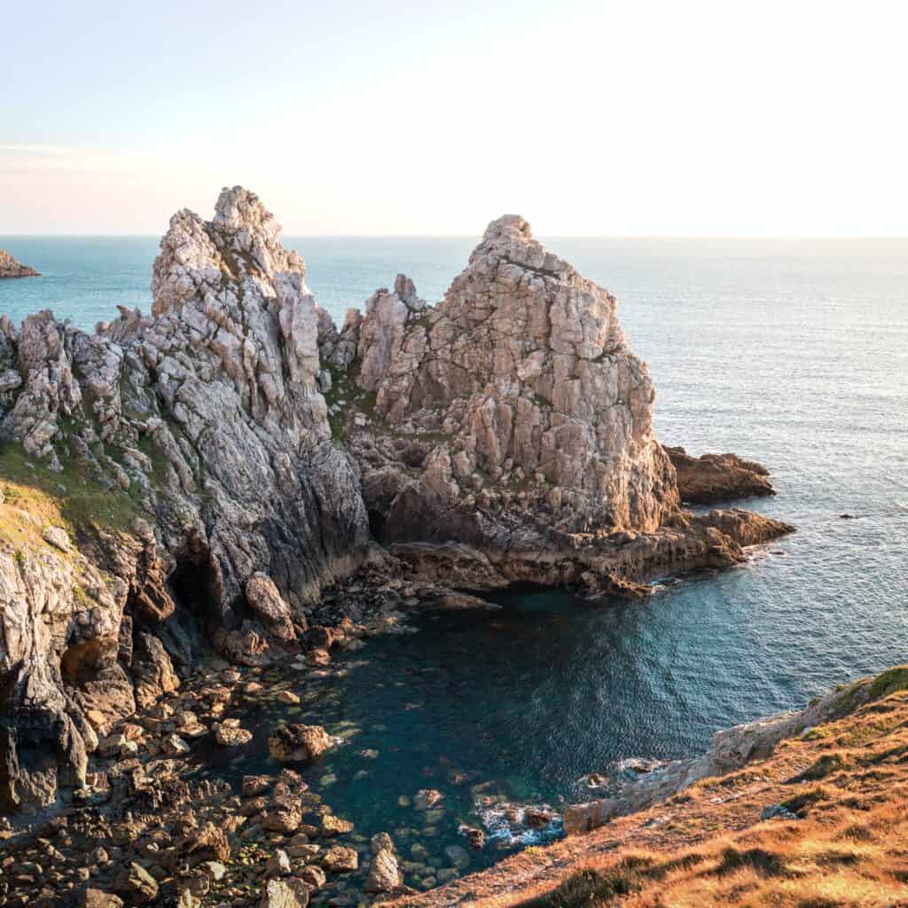 The beautiful rugged coastline of Brittany. Sail there with active holidays with Classic Sailing