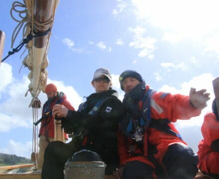 Tallulah crew helming Spring 2023. they know why sailing holidays great value for money?