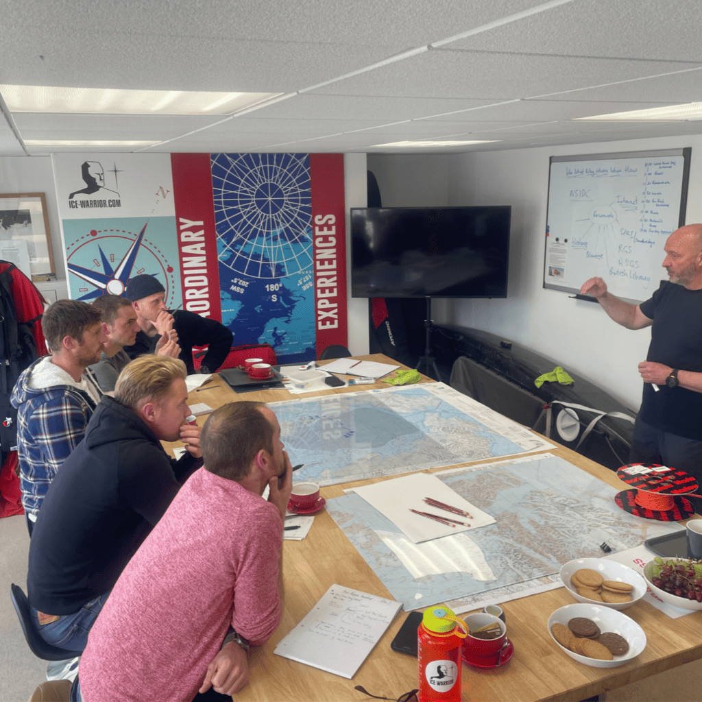 Polar explorer Jim McNeill leads an Ocean Warrior planning session. Join the expedition through Classic Sailing
