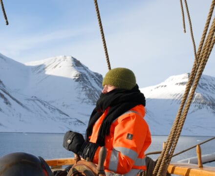 Crew of Linden wrapped up warm in the Svalbard sunshine. Join a citizen science expedition in the Arctic with Classic Sailing