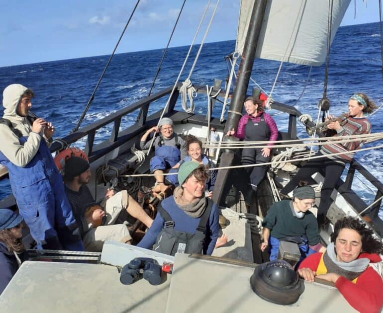 Cross the Atlantic, musicians entertain the rest of the crew on watch