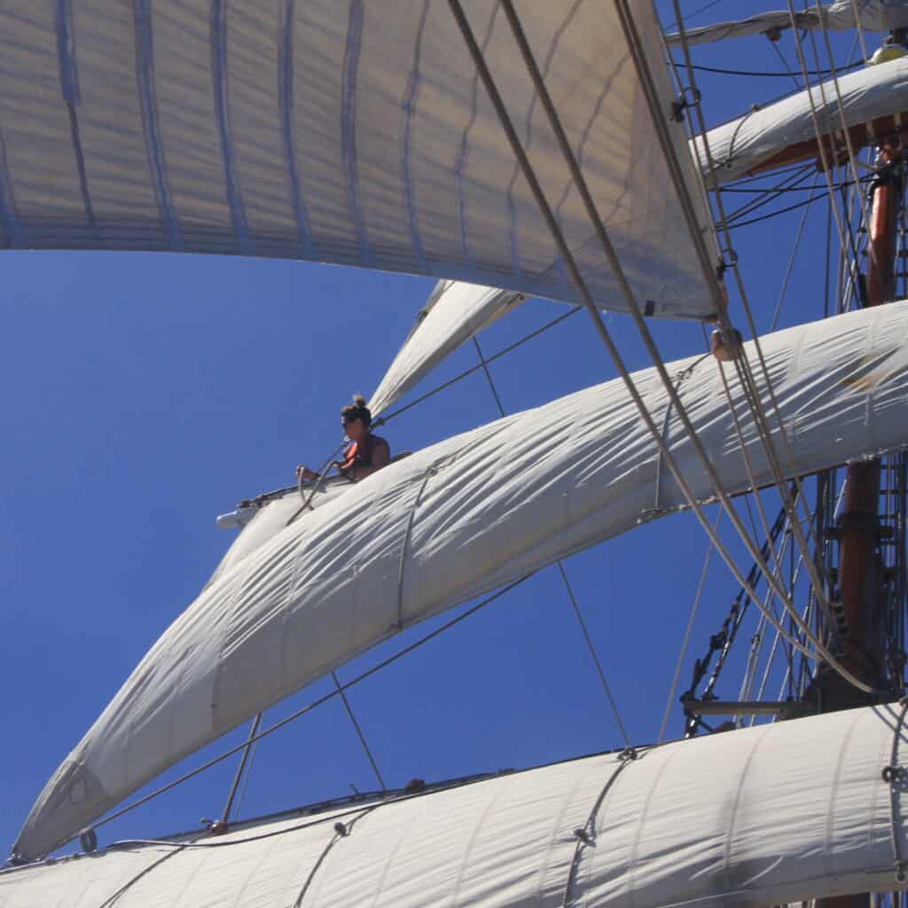 Tall ship sailing can be on square riggers like this or sailing ships with fore and aft sails.