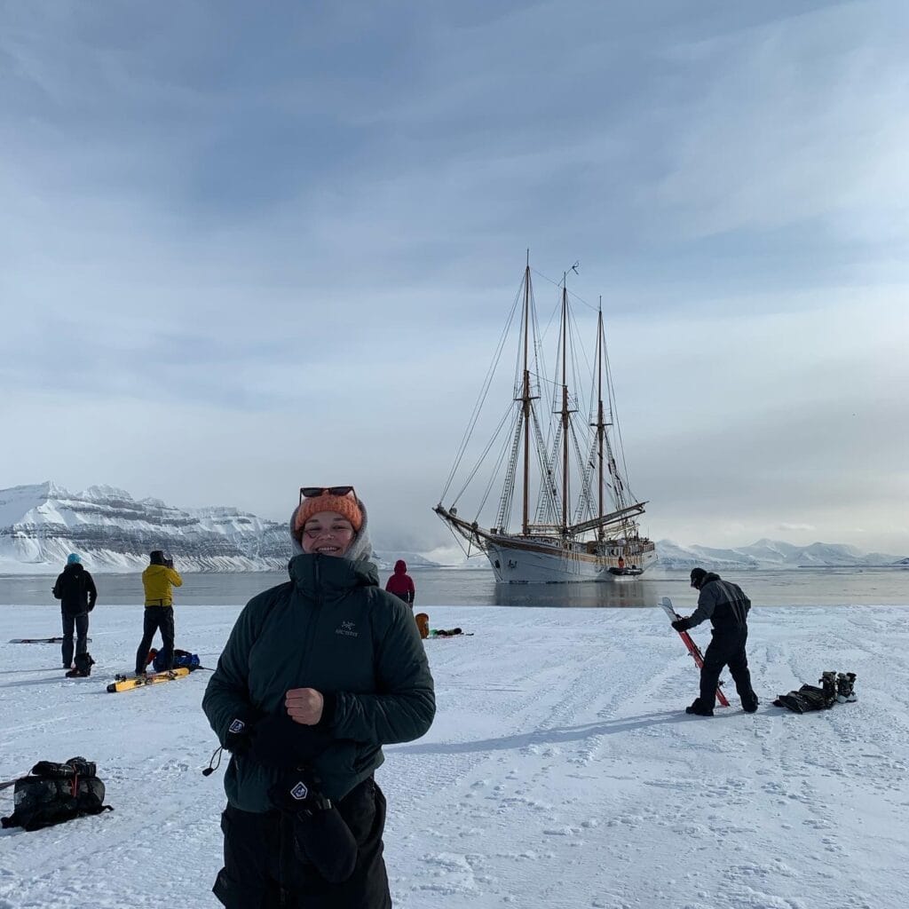 Crew and scientists from tall ship land in Svalbard with skis. An Ocean warrior foundation expedition to gather data from polar regions