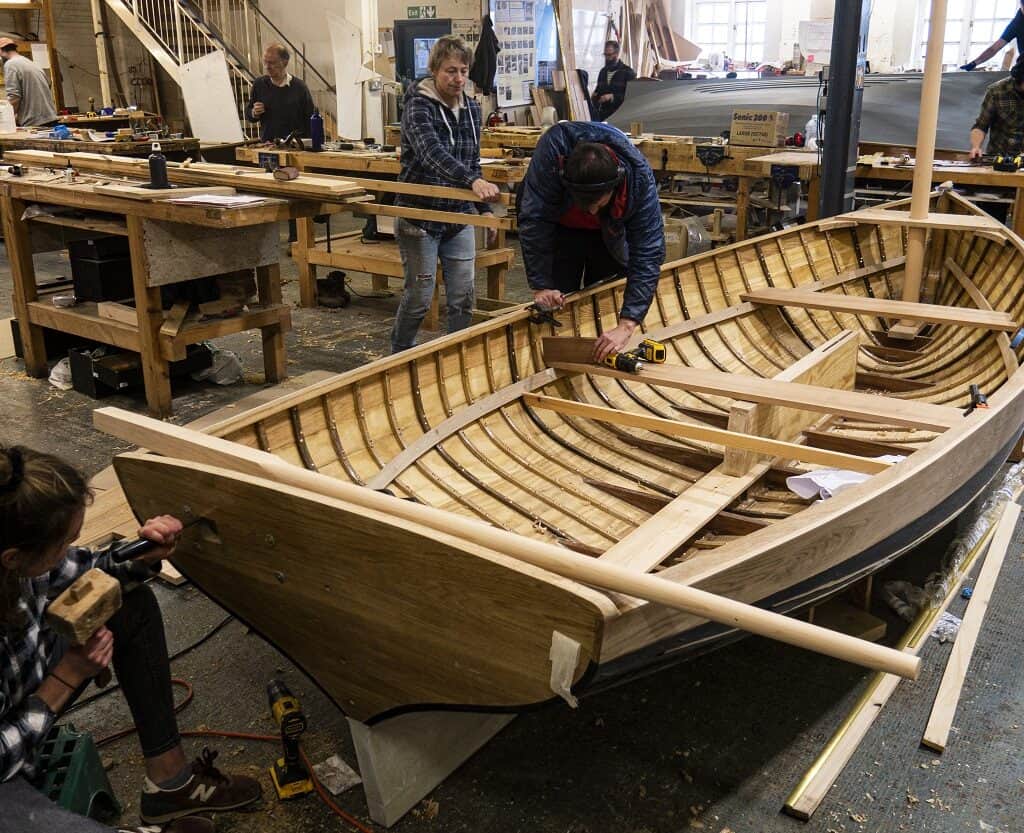 financial assistance to learn to build boats like this