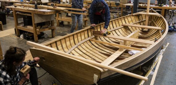 financial assistance to learn to build boats like this