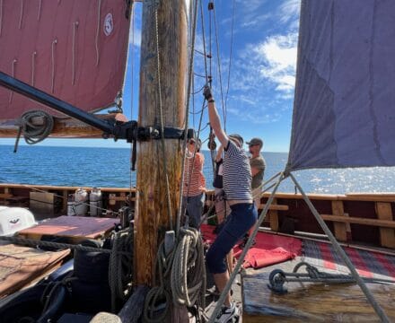 Hoisting the sails on Sunbeam